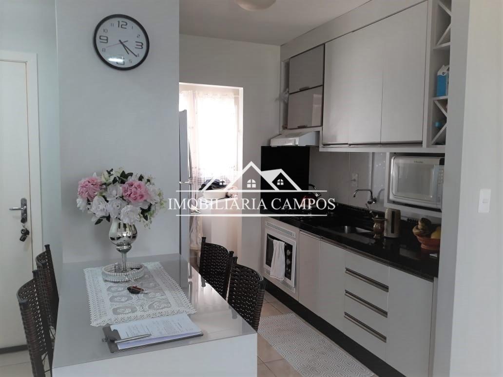 APARTAMENTO TÉRREO PRÓXIMO À PRATI DONADUZZI, COM MÓVEIS PLANEJADOS