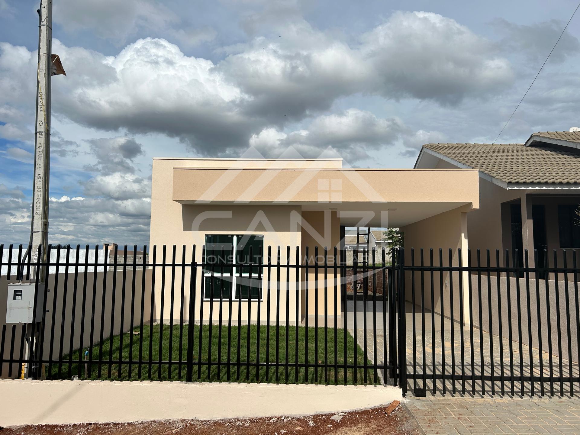 Casa  venda em Realeza, cozinha, sala, 2 quartos e 1 sute, lavanderia, garagem e sobra de terreno.