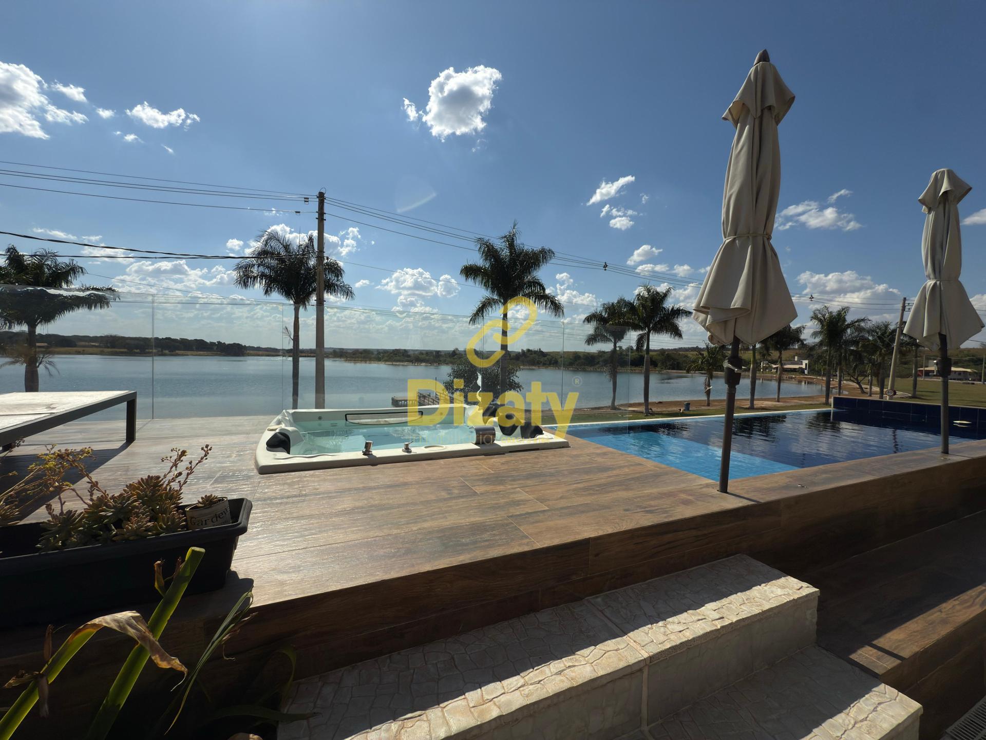 CASA A VENDA NO CONDOMINIO PACU COM 4 SUÍTES, SENDO 1 SUÍTE MA...