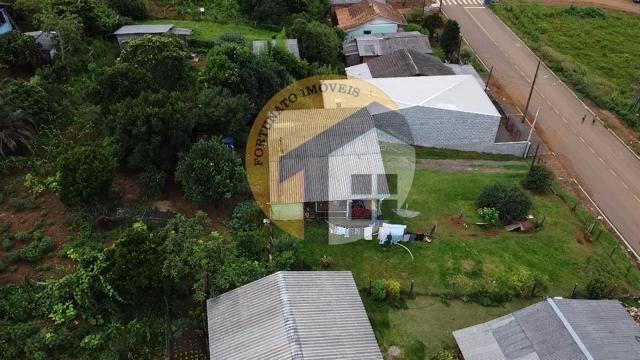 VENDE-SE CASA COM AMPLO TERRENO