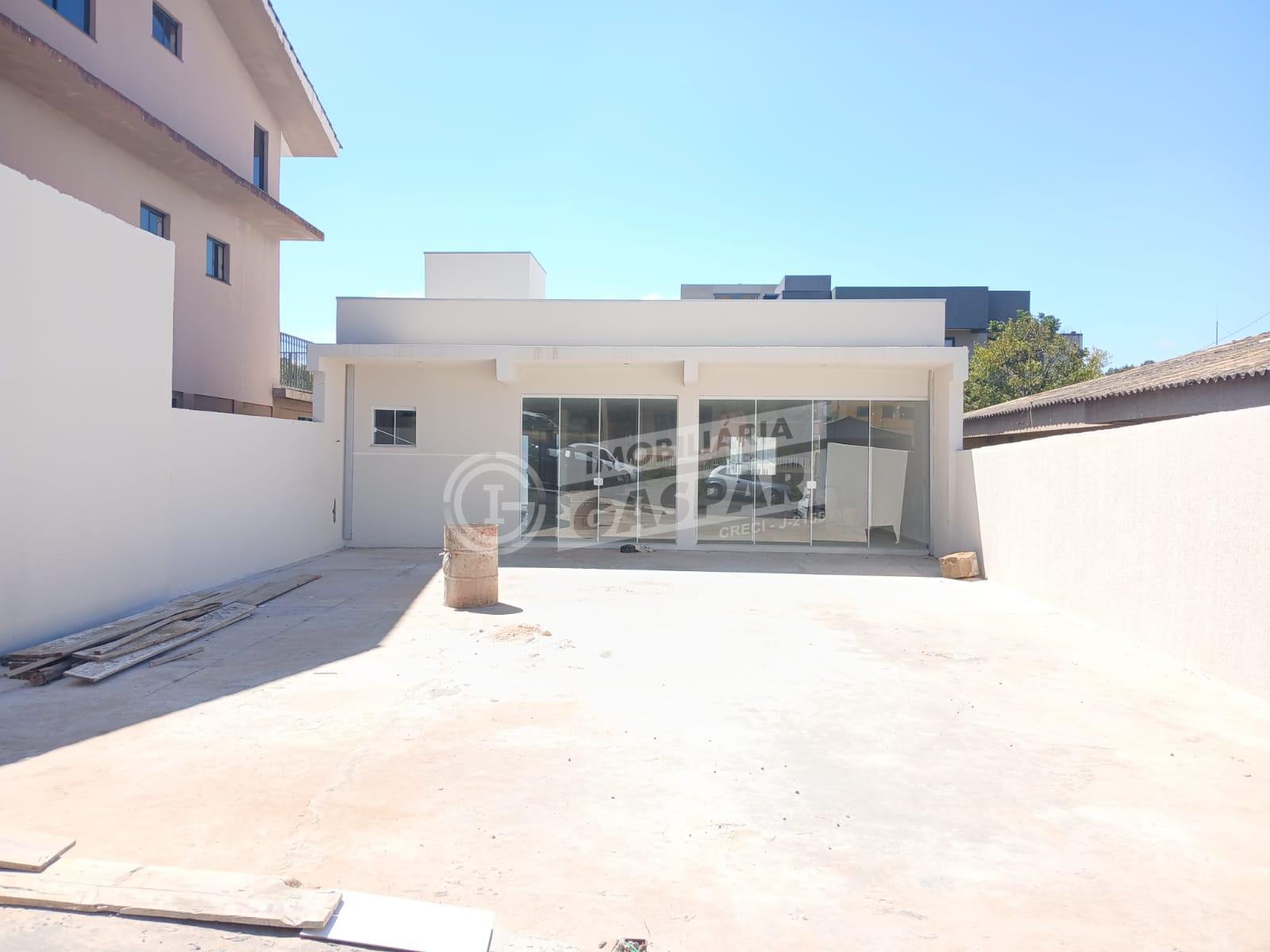 UMA SALA COMERCIAL EM ALVENARIA MEDINDO APROX. 130 M2