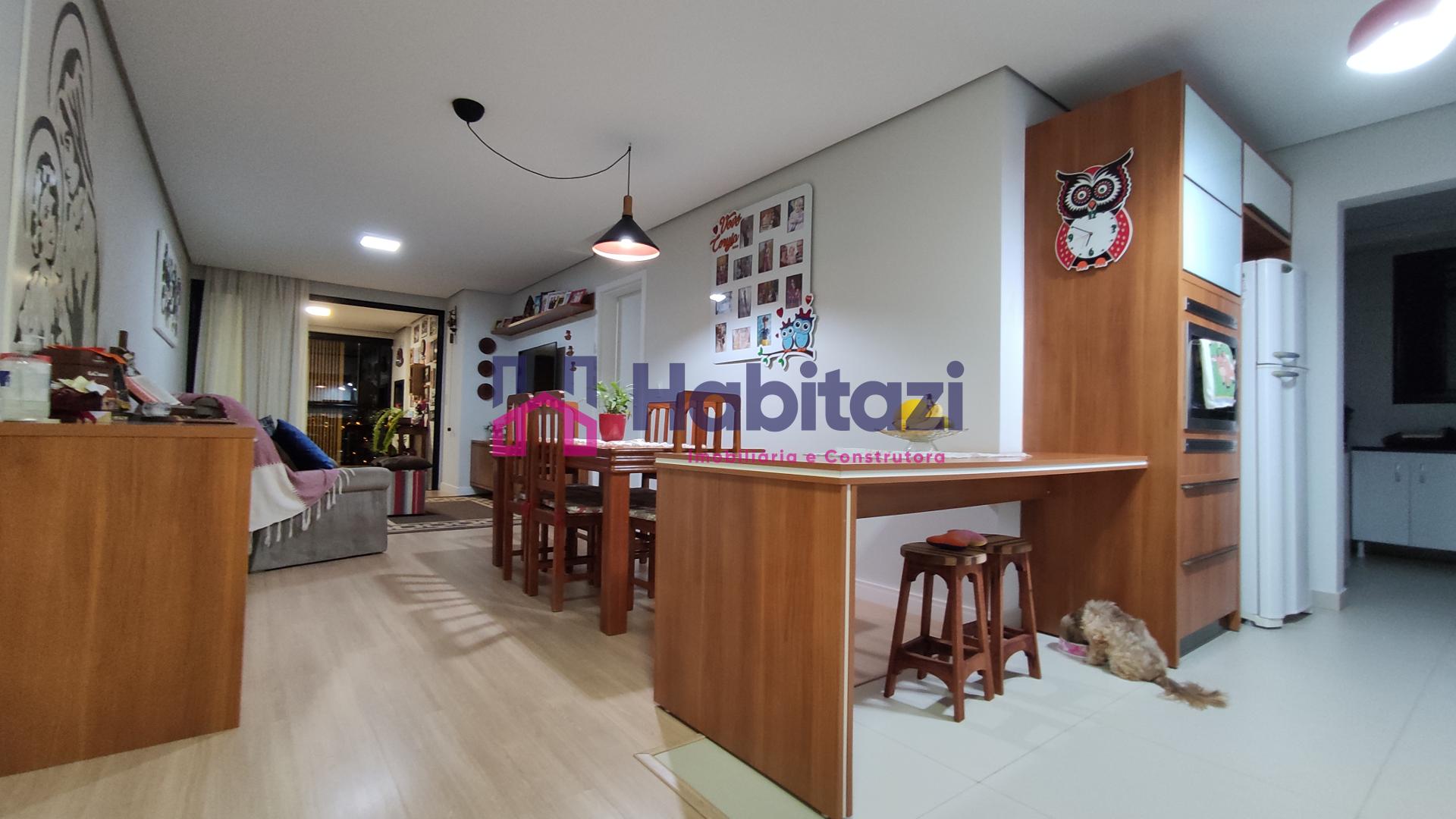 Sala de estar e jantar integrados com a cozinha