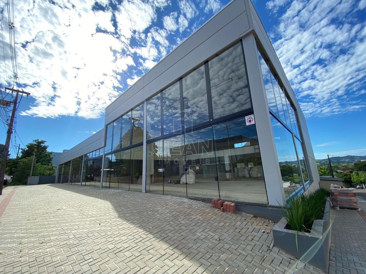 SALA DE ESQUINA COM FACHADA EM VIDRO - BAIRRO LUTHER KING - Jean Imóveis