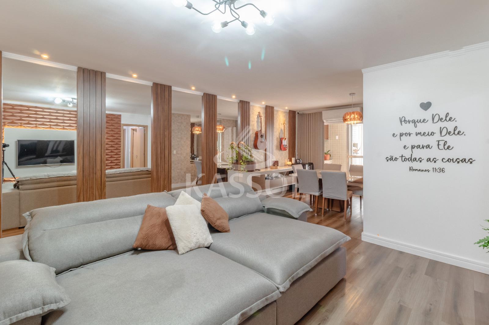Apartamento com 1 suite e 2 quartos e 2 vagas lado a lado.