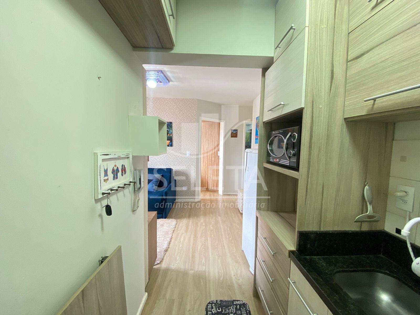 APARTAMENTO SEMI MOBILIADO NO CENTRO.