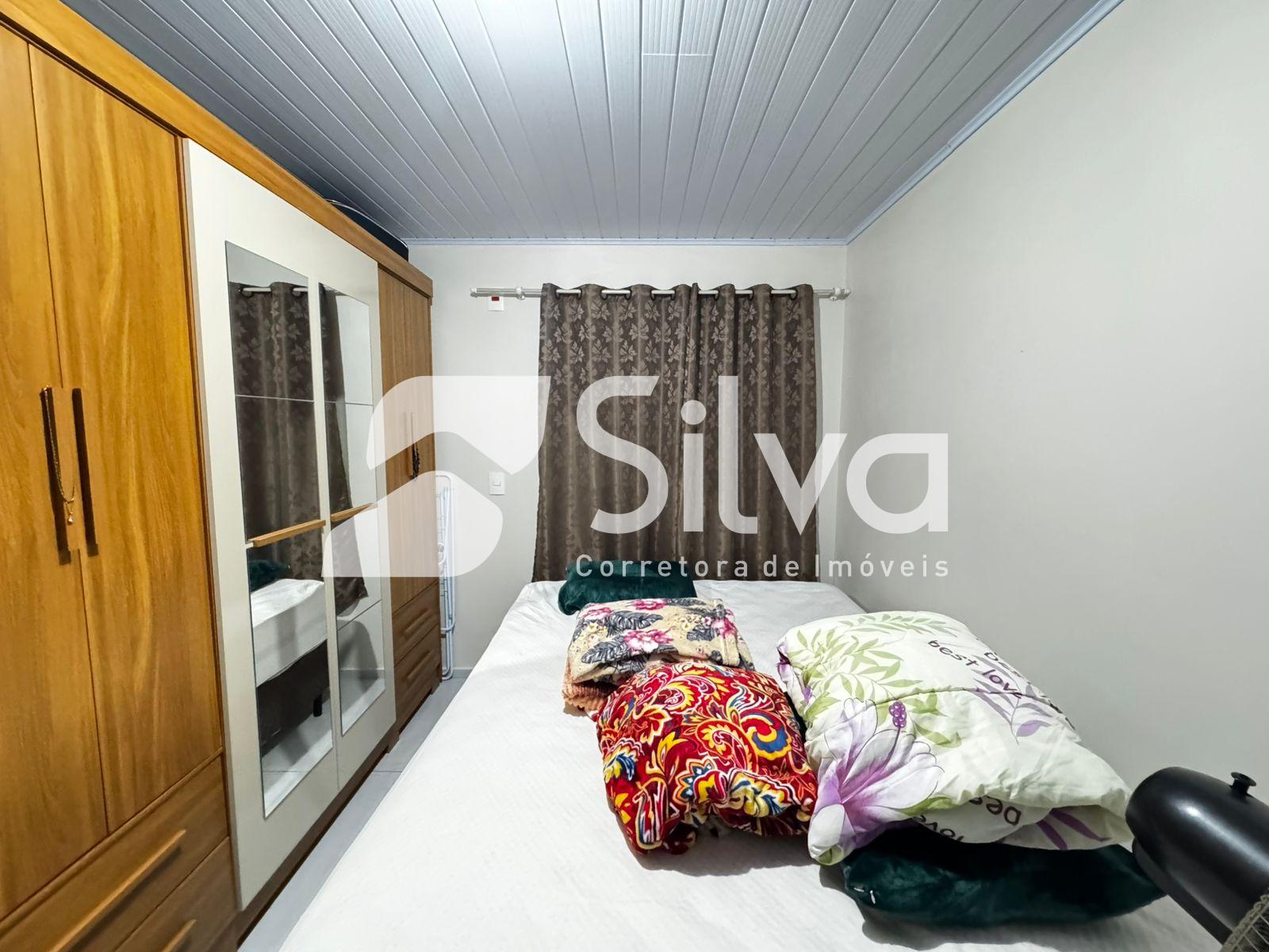 Casa a venda localizada no Loteamento Meredick, Dois Vizinhos-PR.