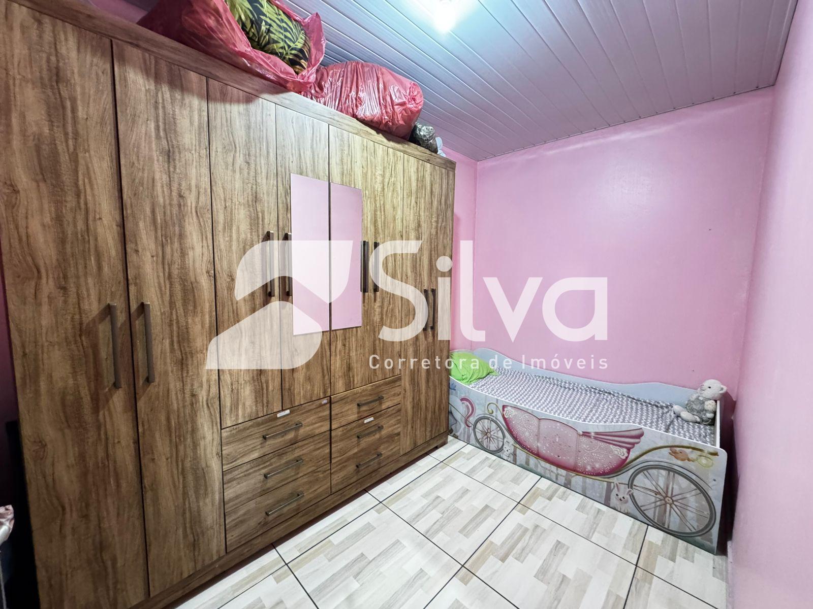 Casa a venda localizada no Loteamento Meredick, Dois Vizinhos-PR.