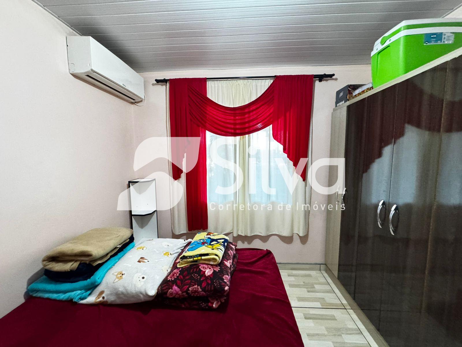 Casa a venda localizada no Loteamento Meredick, Dois Vizinhos-PR.