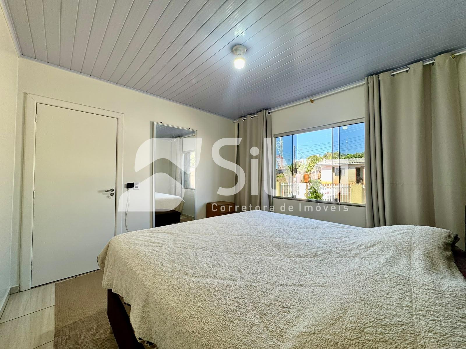 Casa à venda localizada no Bairro Jardim da Colina, Dois Vizinhos-PR.