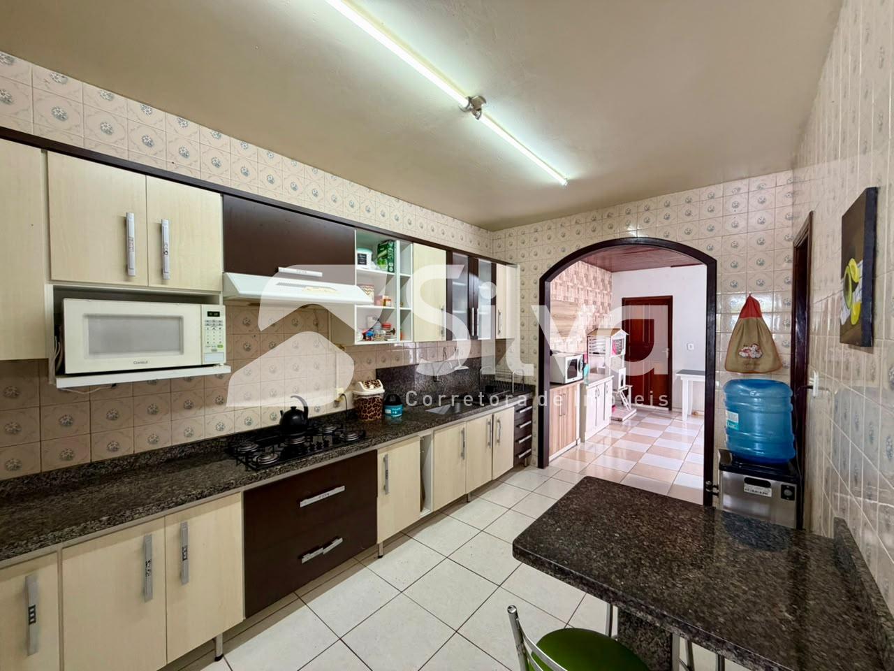 Casa à venda localizada no Bairro das Torres, Dois Vizinhos-PR.