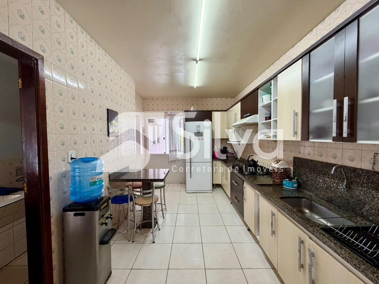 Casa à venda localizada no Bairro das Torres, Dois Vizinhos-PR.