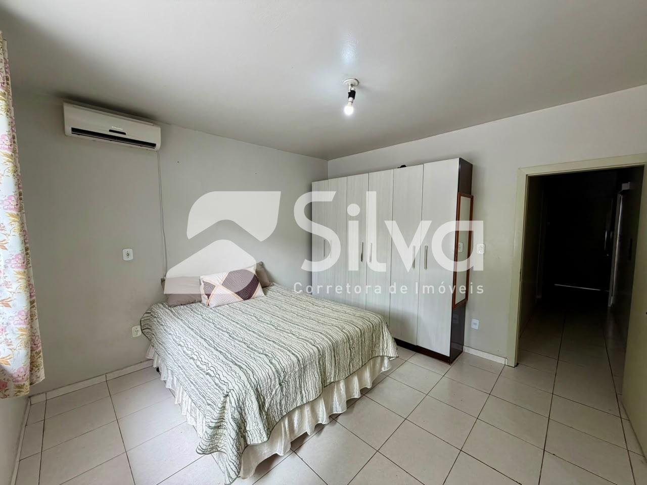 Casa à venda localizada no Bairro das Torres, Dois Vizinhos-PR.