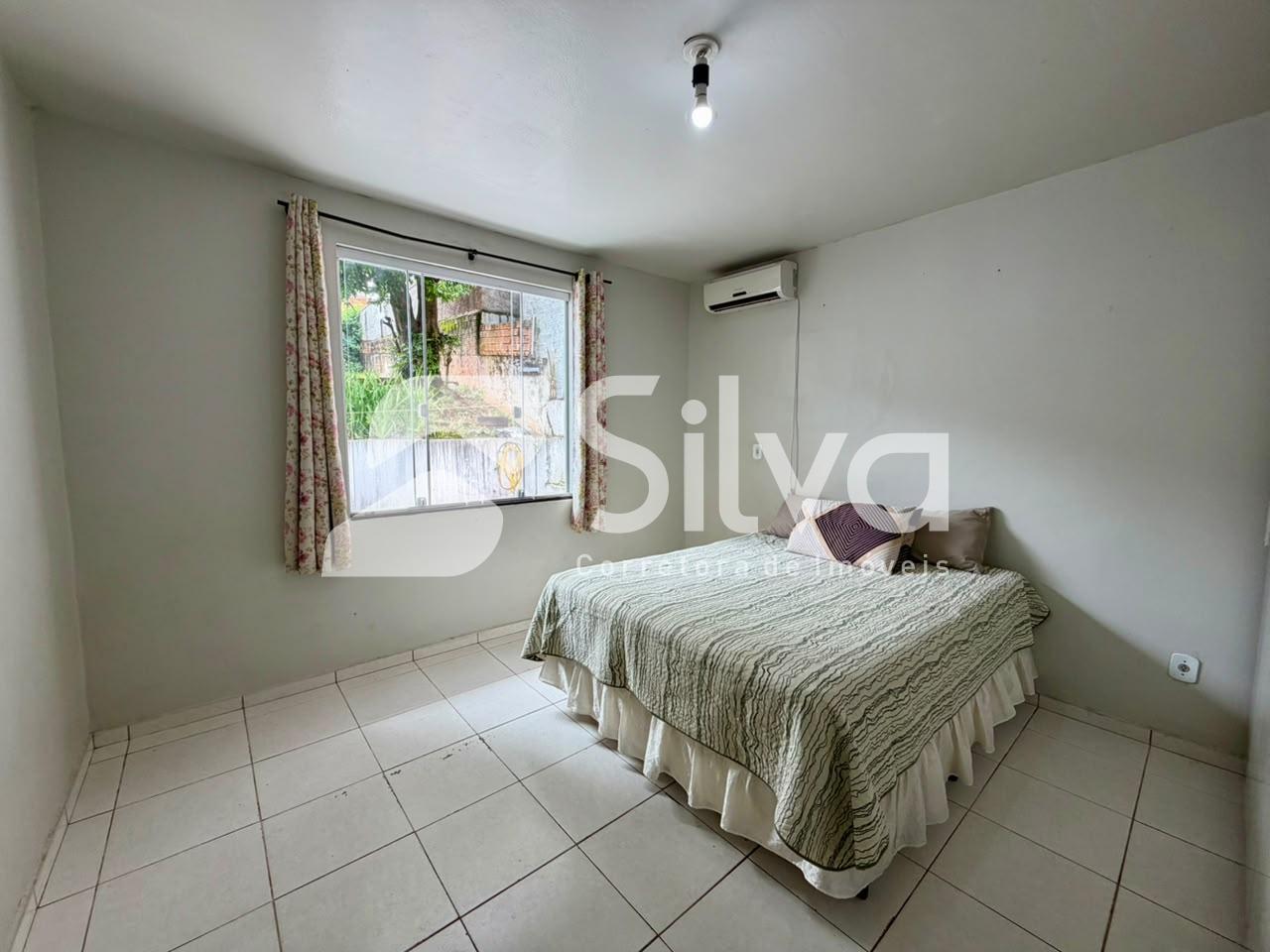 Casa à venda localizada no Bairro das Torres, Dois Vizinhos-PR.