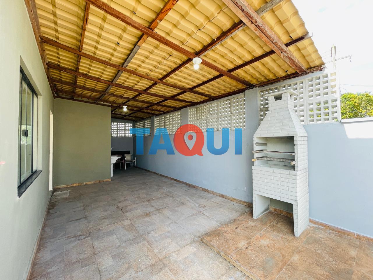 Área de serviço e churrasqueira