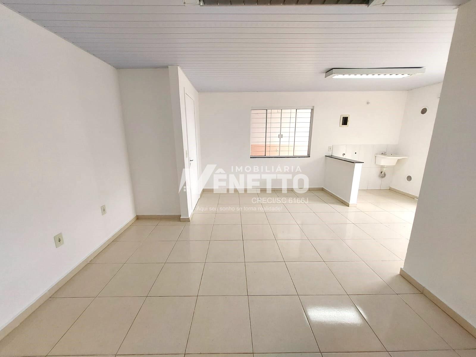 Apartamento com 03 dormitórios no centro com vaga de garagem coberta
