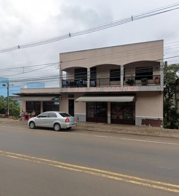 Prdio comercial com 01 apartamento de aproximadamente 140,00m , mais 02 salas comerciais.