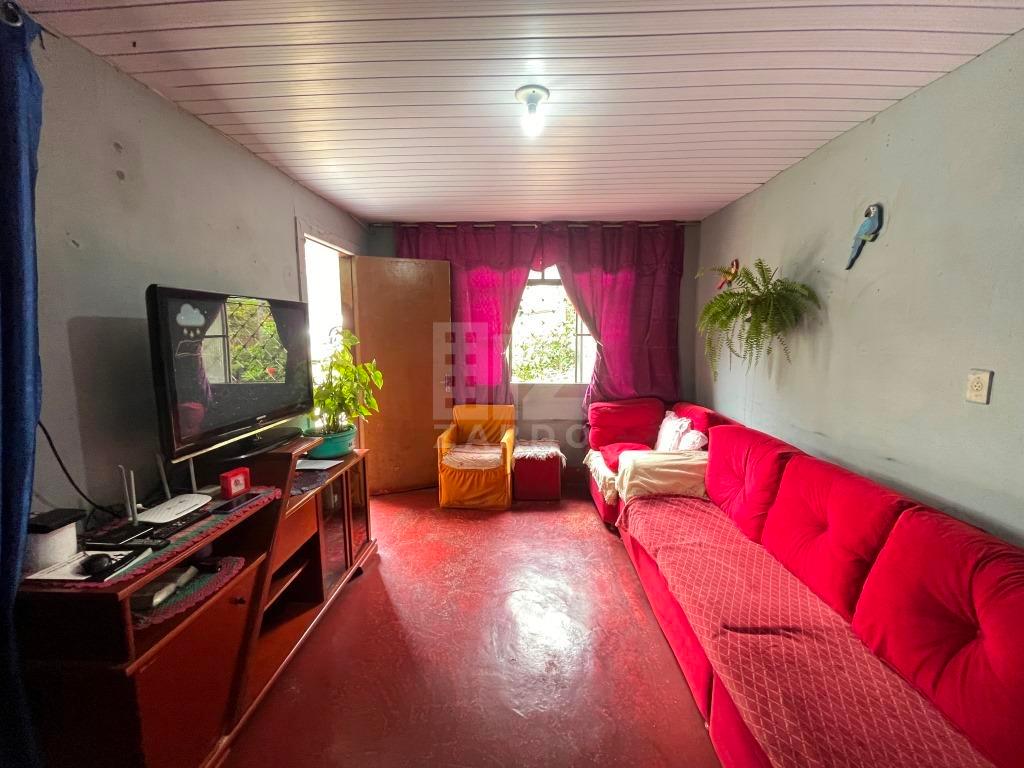 CASA LOCALIZADA PRÓXIMO DA CORFIO.